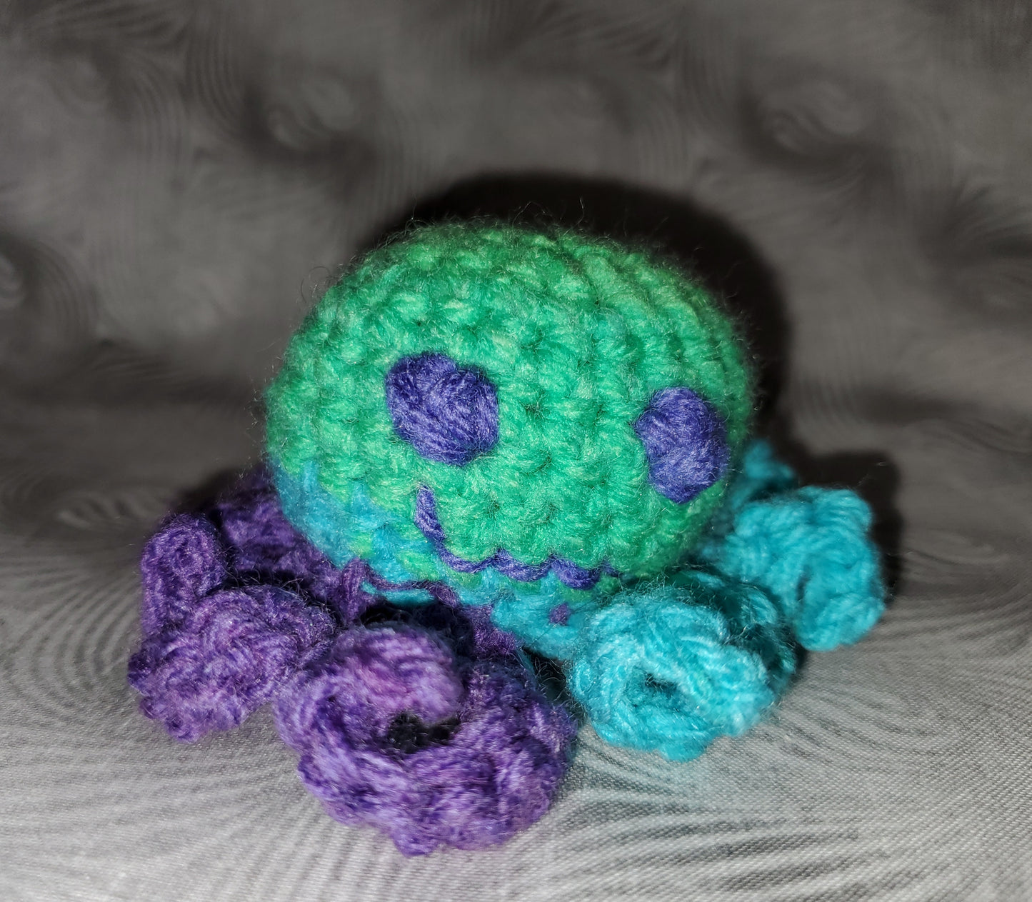 Bright Green Crochet Octopus with Blue and Purple Tentacles