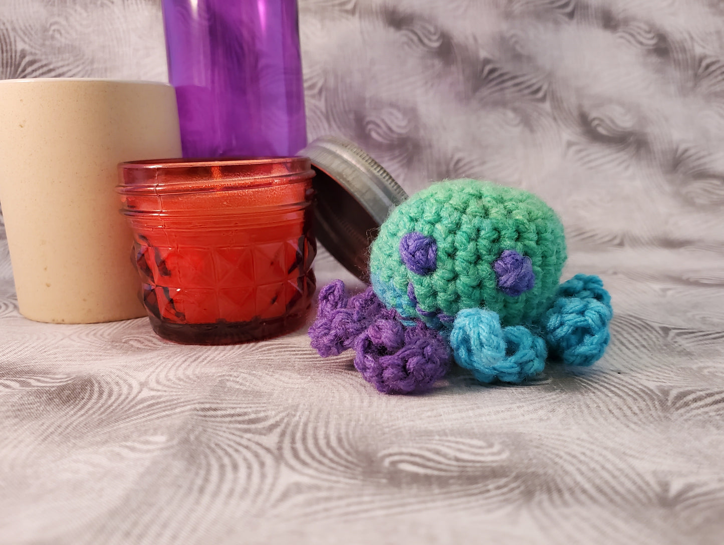 Bright Green Crochet Octopus with Blue and Purple Tentacles