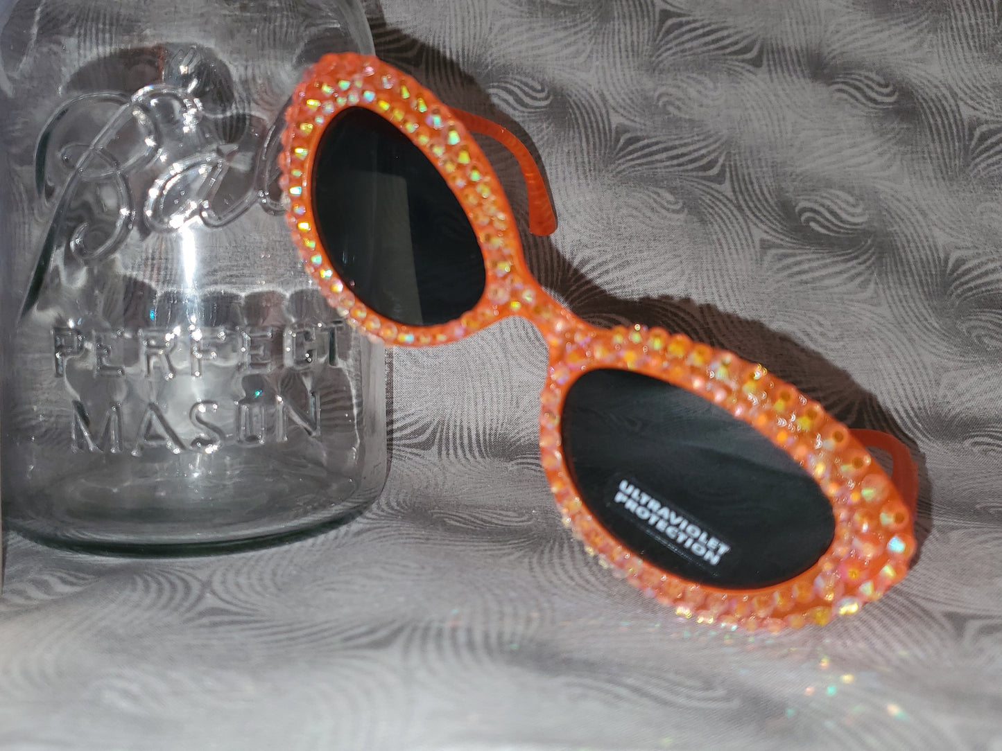 Retro 80s-Inspired Orange Sunglasses with Sparkling Rhinestones