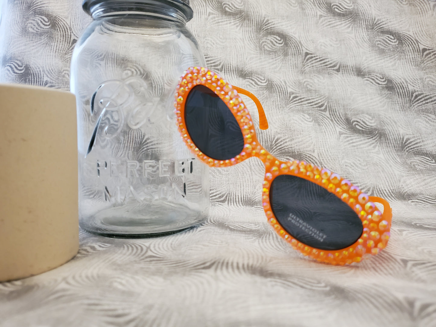 Retro 80s-Inspired Orange Sunglasses with Sparkling Rhinestones