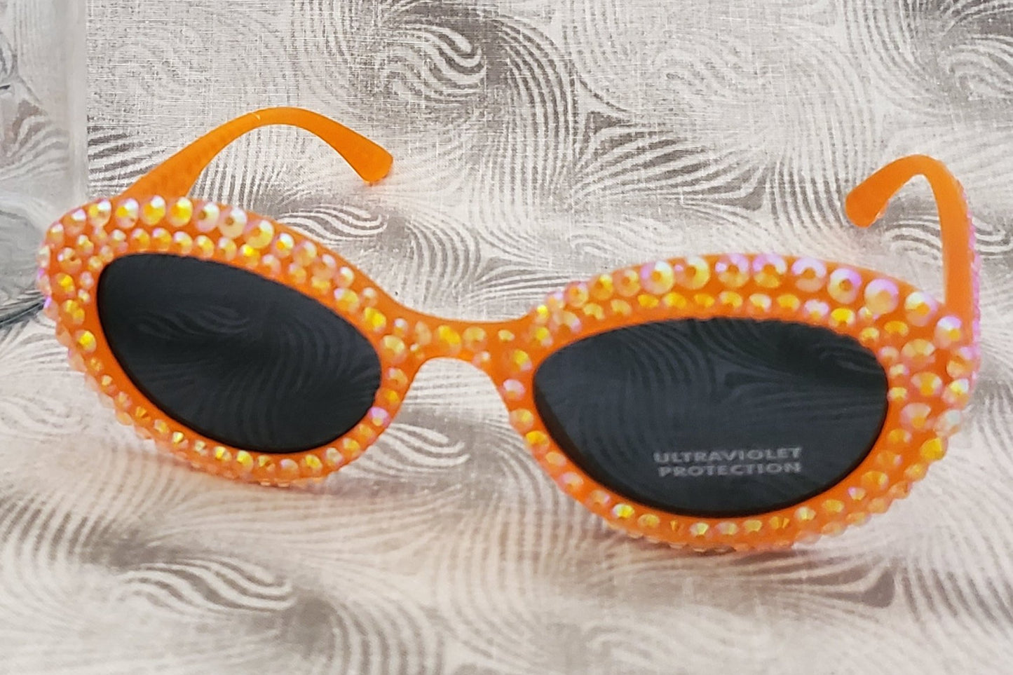 Retro 80s-Inspired Orange Sunglasses with Sparkling Rhinestones