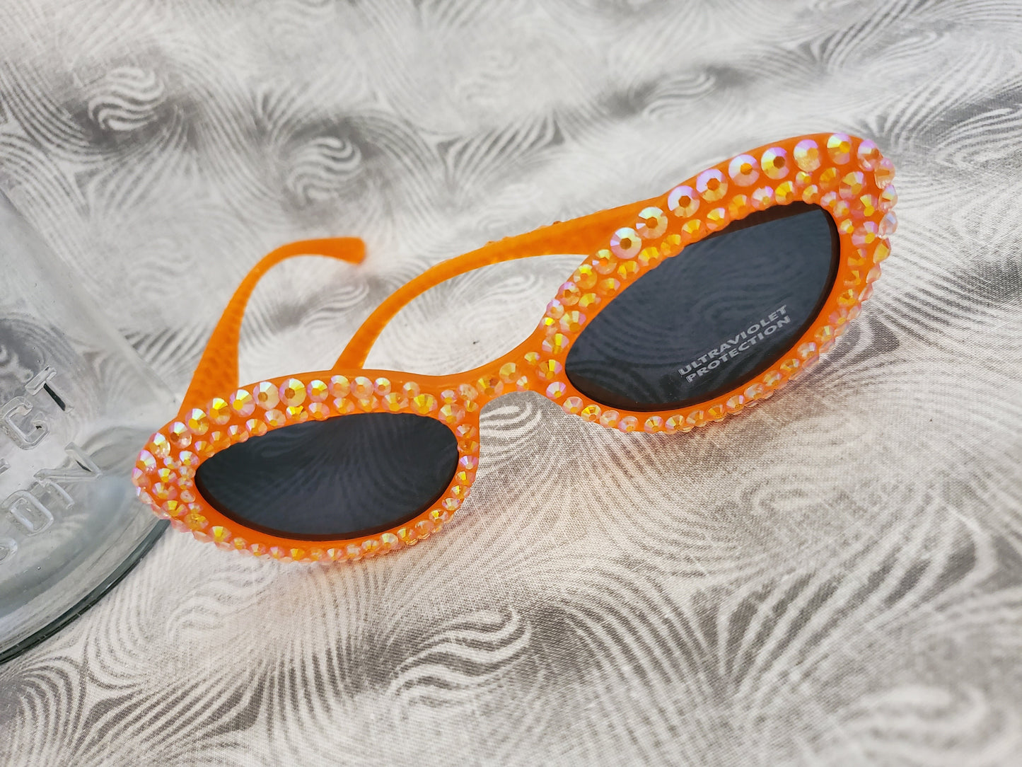 Retro 80s-Inspired Orange Sunglasses with Sparkling Rhinestones